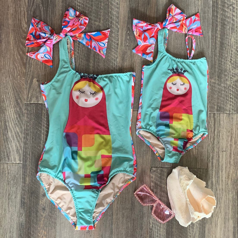 Conjunto Onepiece  Tifanny Moño Matrioska y Pareo Olan Largo Mujer